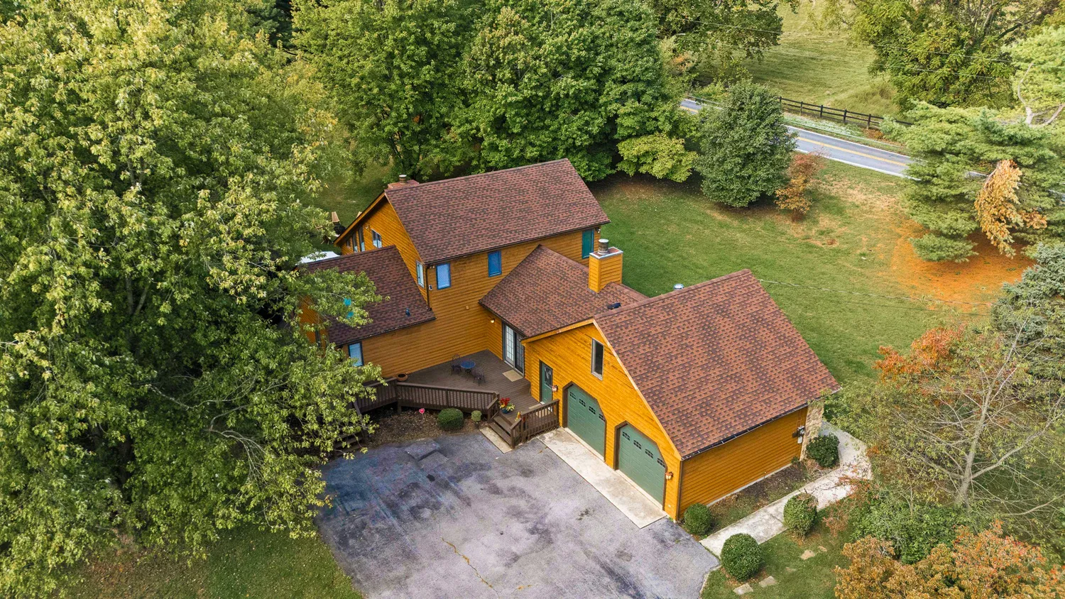 Aerial photo of a home in the woods