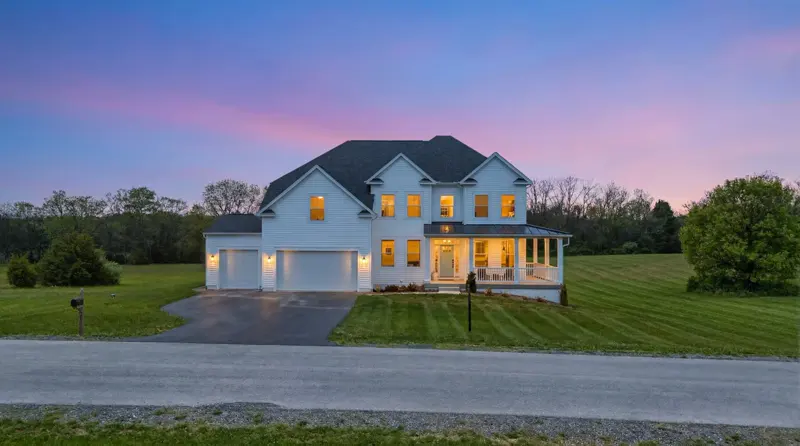 Virtual twilight photo of a colonial home